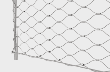 A corner of frameless rope mesh system after installation