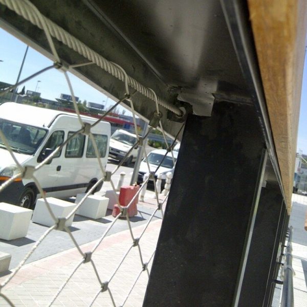 Frameless rope mesh system is installed on the road fence.