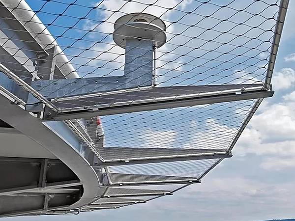 Roof helipad is surrounded with helideck safety net.
