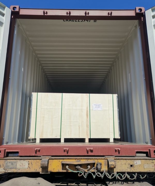 Wooden cases are placed in the truck compartment.