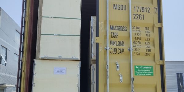 Well-packed goods are loaded in the truck compartment.