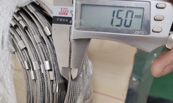 A caliper is used to check the wire rope mesh size.